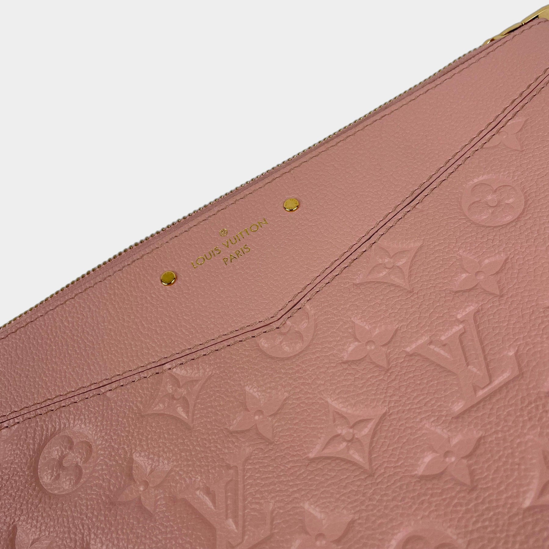Louis Vuitton Monogram Empreinte Daily Pouch - Pink Clutches